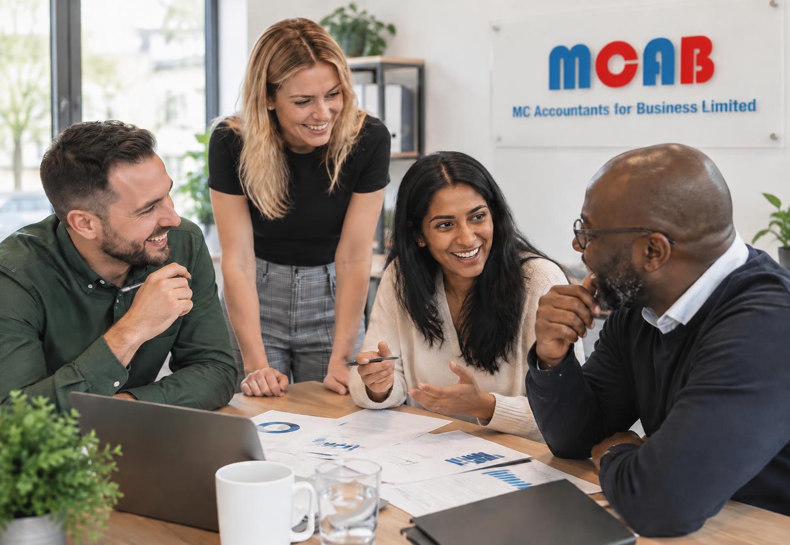 The MC Accountants team discussing client reports